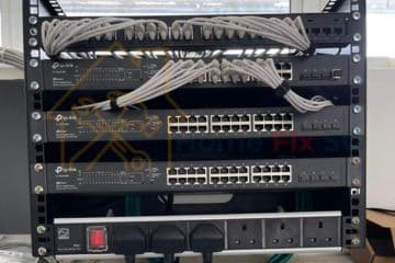 A neatly organized network server rack with TP-Link switches and professional structured cabling installed by Home Fix SG in Singapore.